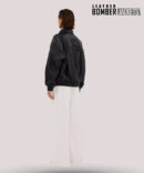 Back-view-of-oversized-black-leather-bomber-jacket-heavy-grade-leather-casual-street-style-look-available-to-buy-online-scaled.