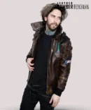 Authentic-Cyberpunk-2077-brown-leather-jacket-showcasing-cyberpunk-style-tall-collar-studded-left-arm-detail-and-multiple-pockets-for-practical-use