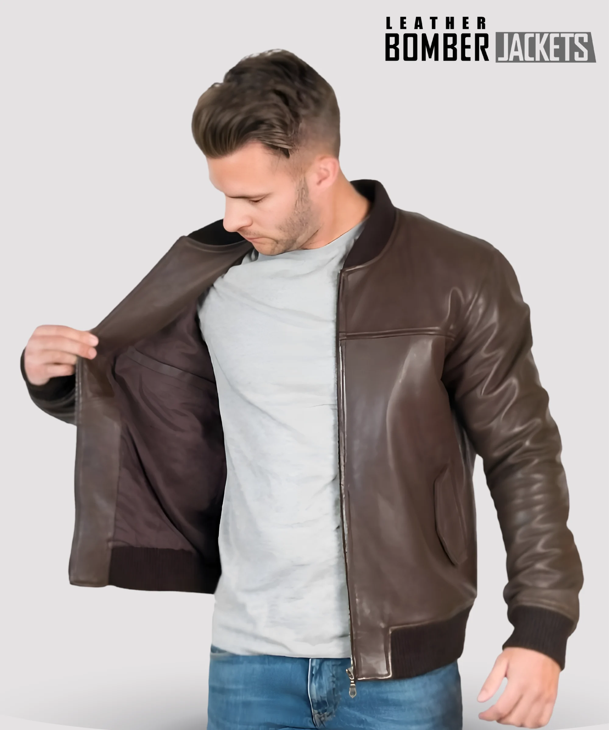 Classic-brown-leather-bomber-jacket-for-men-featuring-zip-waist-pockets-press-stud-flaps-and-dark-matte-lining-with-inside-secure-storage