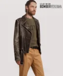 Side angle showing men’s brown leather bomber jacket worn open, with inner quilted viscose lining and visible interior storage pocket.